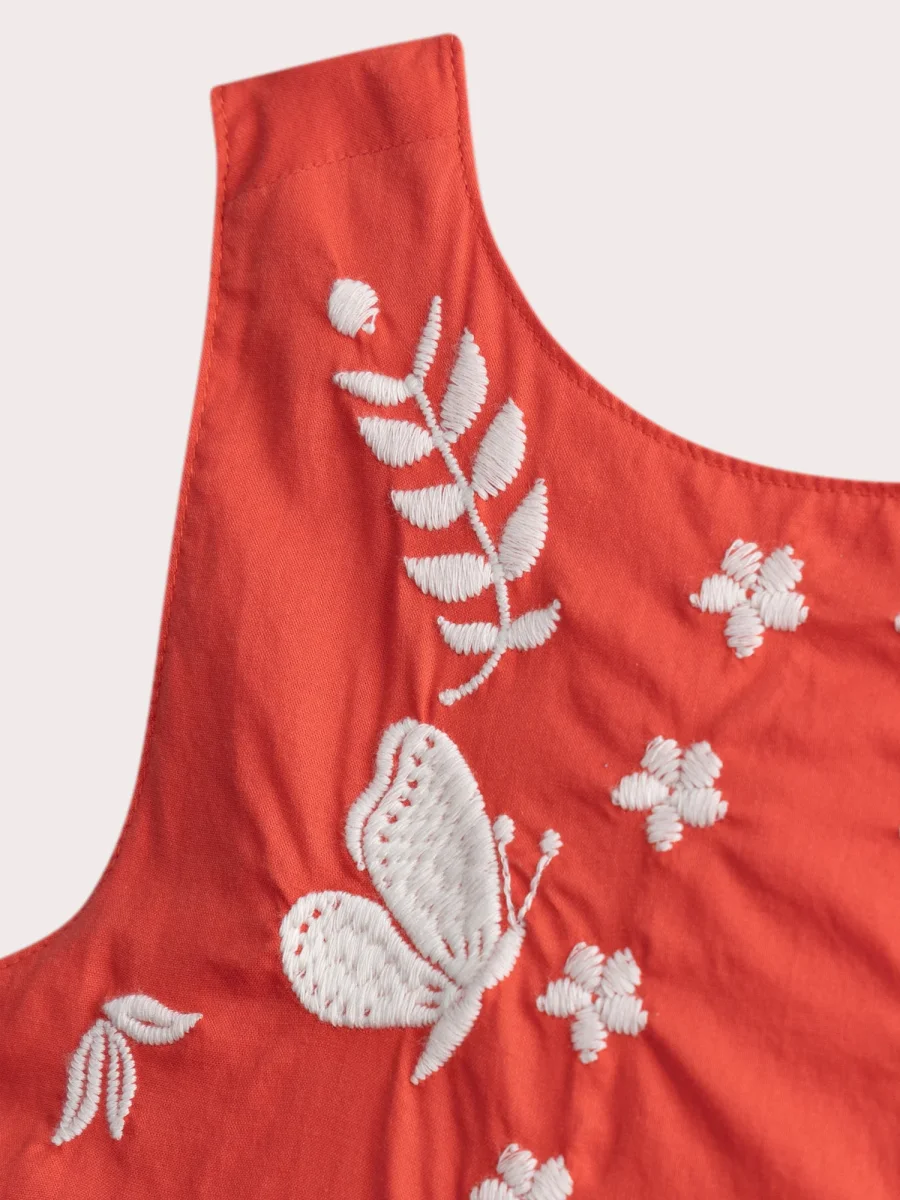 Robe orangée brodée croisée dans le dos - Image 3